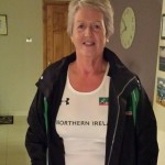 Eileen Stewart in the Northern Ireland vest and tracksuit.